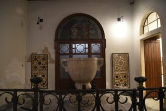 the baptismal font in the Duomo on Ortigia Island in Syracuse