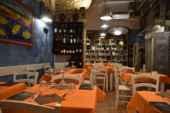 inside Torattoria Spizzuliamu, a restaurant in Syracuse in Sicily