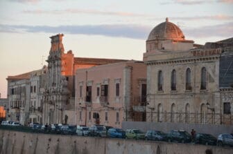 the buildings in pink just after the sunset in Syracuse