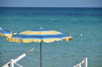 beautiful sea and a parasol at Fontane Bianche beach
