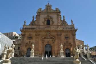 Cathedral of San Giorgio in Modica surrounded by flowers