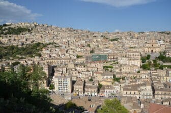 Cathedral of San Giorgio in Modica surrounded by flowers