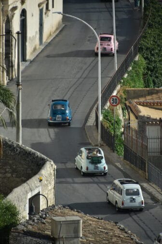 lovely old Fiat cars seen from Cathedral of San Giorgio in Modica, Sicily