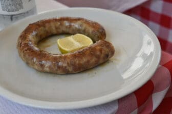 a sausage at Trattoria la Bettola, a restaurant in Ragusa Ibla, Sicily