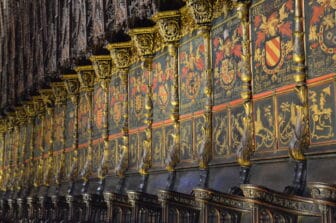 the pattern on the choir seats in the cathedral in Barcelona, Spain