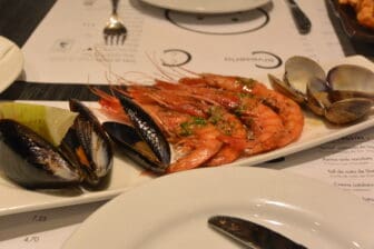 grilled seafood of Cerveceria Catalana, a tapas restaurant in Barcelona, Spain