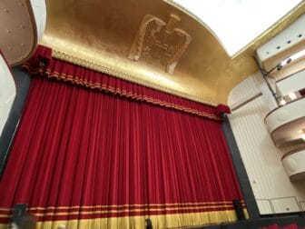 the stage curtain of Teatro Lirico in Milan, Italy