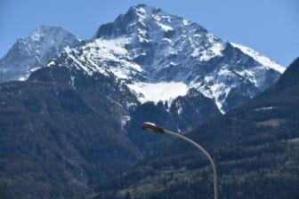 the snowy mountains seen from Aosta, Italy