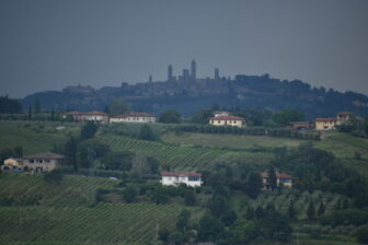 San Gimignano seen from the restaurant L'Antica Fonte in Certaldo in Tuscany in Italy