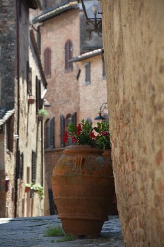 a street of the old town of Certaldo in Tuscany, Italy