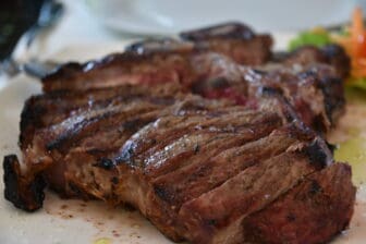 Bistecca alla Fiorentina at L'Antica Fonte, the restaurant in Certaldo in Tuscany, Italy