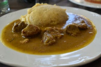 lamb stew with Polenta at Trattoria dei Bracconieri, a restaurant in Brunate in northern Italy