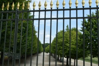 garden of the Fontainebleau Palace with the fence