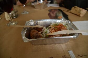 the meatballs and rice lunch in the takeaway container in Meteora