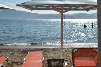 the scene of Karathona Beach, Nafplio in Greece