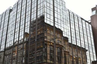 reflection of the old building on the new building in Glasgow, Scotland