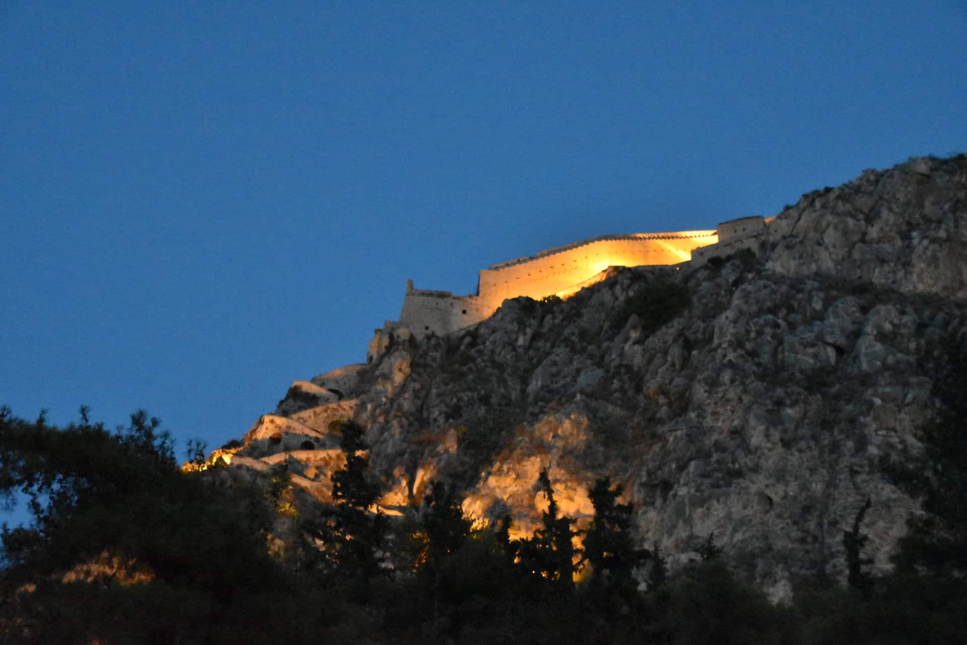 the fortress on the hill in Nafplio, Greece at night