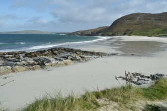 white sand beach on Barra Island in Hebrides, Scotland