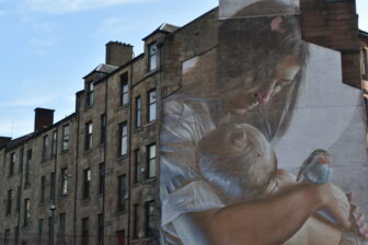 St. Mungo and his mother depicted on the wall in Glasgow, Scotland