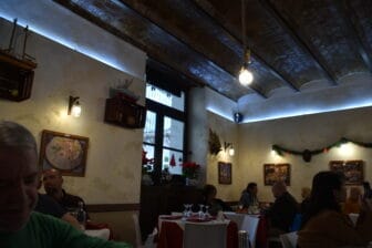 the interior of Trattoria il Combusone, a restaurant in Palermo, Sicily in Italy