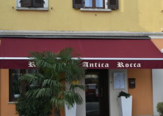 the entrance of Antica Rocca, a restaurant in Soncino in Lombardy, Italy 