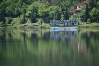 an old boat on the lake of Belsh in Albania