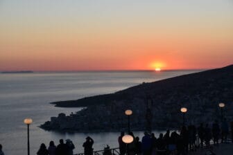 people on the hill of Lekursi to see the sunset in Saranda, Albania