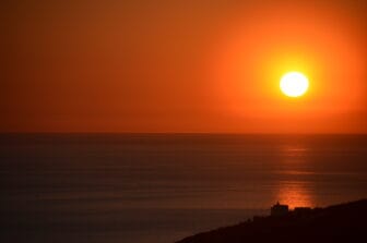 the sunset seen from the hill of Lekursi in Saranda, Albania