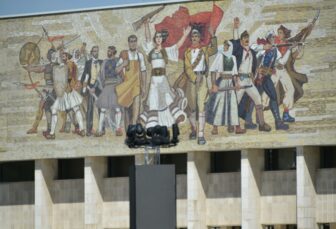 picture of people on the building of National History Museum in Tirana, Albania