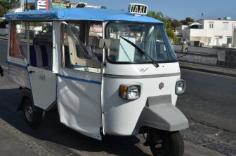 Ape taxi seen at the Ischia Port on Ischia island in Italy