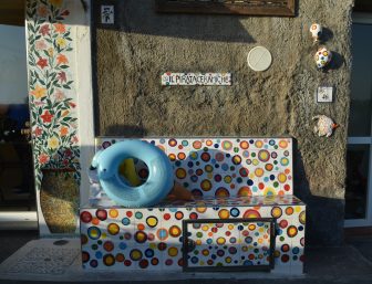 bench in front of a fashionable shop in Sant'Angelo on Ischia island, Italy