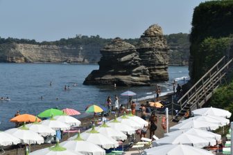 the beach with the Faraglioni on Procida island in Italy