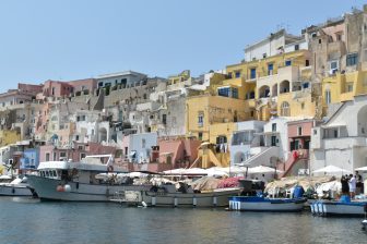 the old town port of Procida island seen from the sea