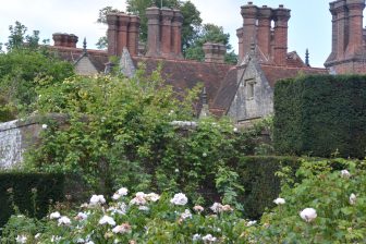 the main house and flowers in Borde Hill, a garden in south England