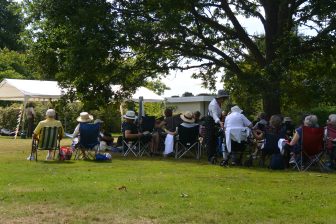 people in the shade in the garden called Borde Hill in south England