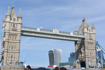 Tower Bridge and Walkie-Talkie seen from the sightseeing boat on Thames in London 