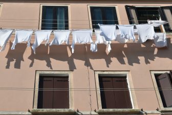 the laundry and shadows seen during our walk in Chioggia, Italy