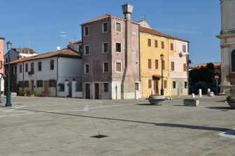 a quiet square in the town of Pellestrina, Italy 