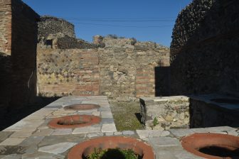 the remain of a pub in Pompeii, southern Italy