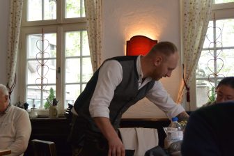 a waiter at Paulaner am alten Postplatz, a restaurant in Stuttgart, Germany