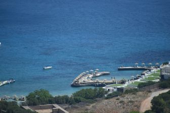 the sea just below the car park, the destination of the Trenino trip from Agios Nikolaos on Crete, Greece