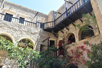 Rich monastery and the painful beach