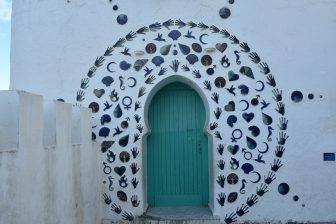 a green door in Assilah, Morocco