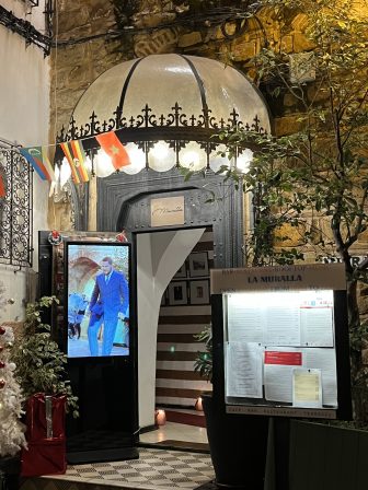 the entrance of the bar where you can drink alcohol in Tangier, Morocco