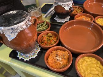 the Tangia pot and vegetables served in Tangia Secret, a restaurant in Marrakesh, Morocco