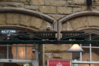 the model train running above the book shelves in Barter Books, an used bookshop in Alnwick in Northumberland, England