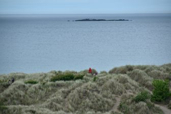 the sea seen from the castle hill in Bamburgh in Northumberland, England