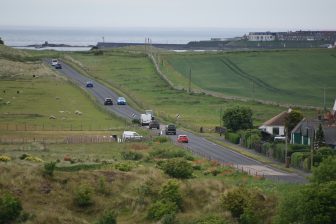 a road running in Bamburgh in Northumberland, England