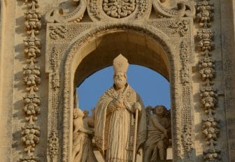 the statue of Saint Oronzo above the entrance of the Duomo in Lecce in the southern Italy